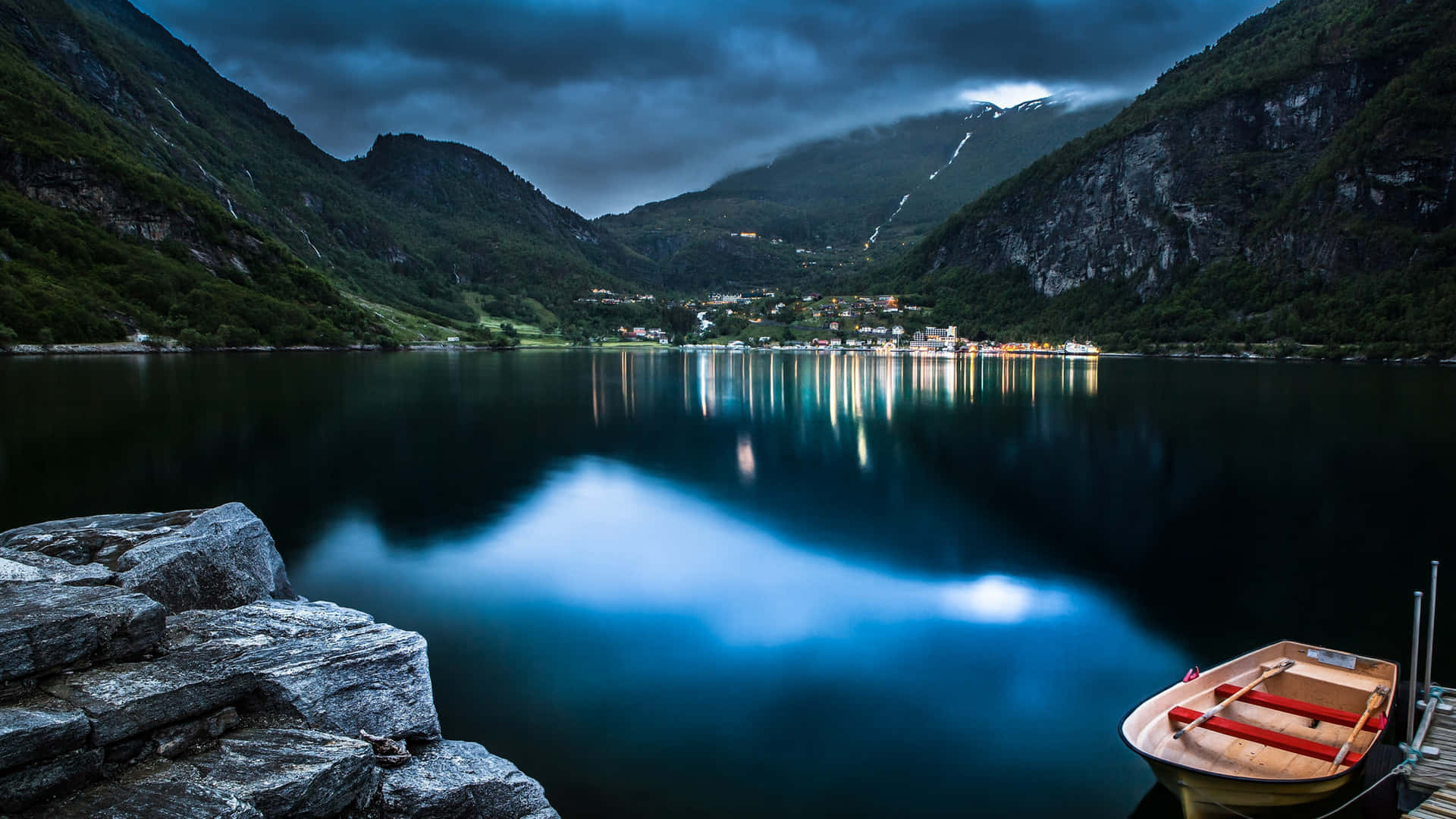 Experience the stillness of nature and soothe your soul with this beautiful mountain lake. Wallpaper