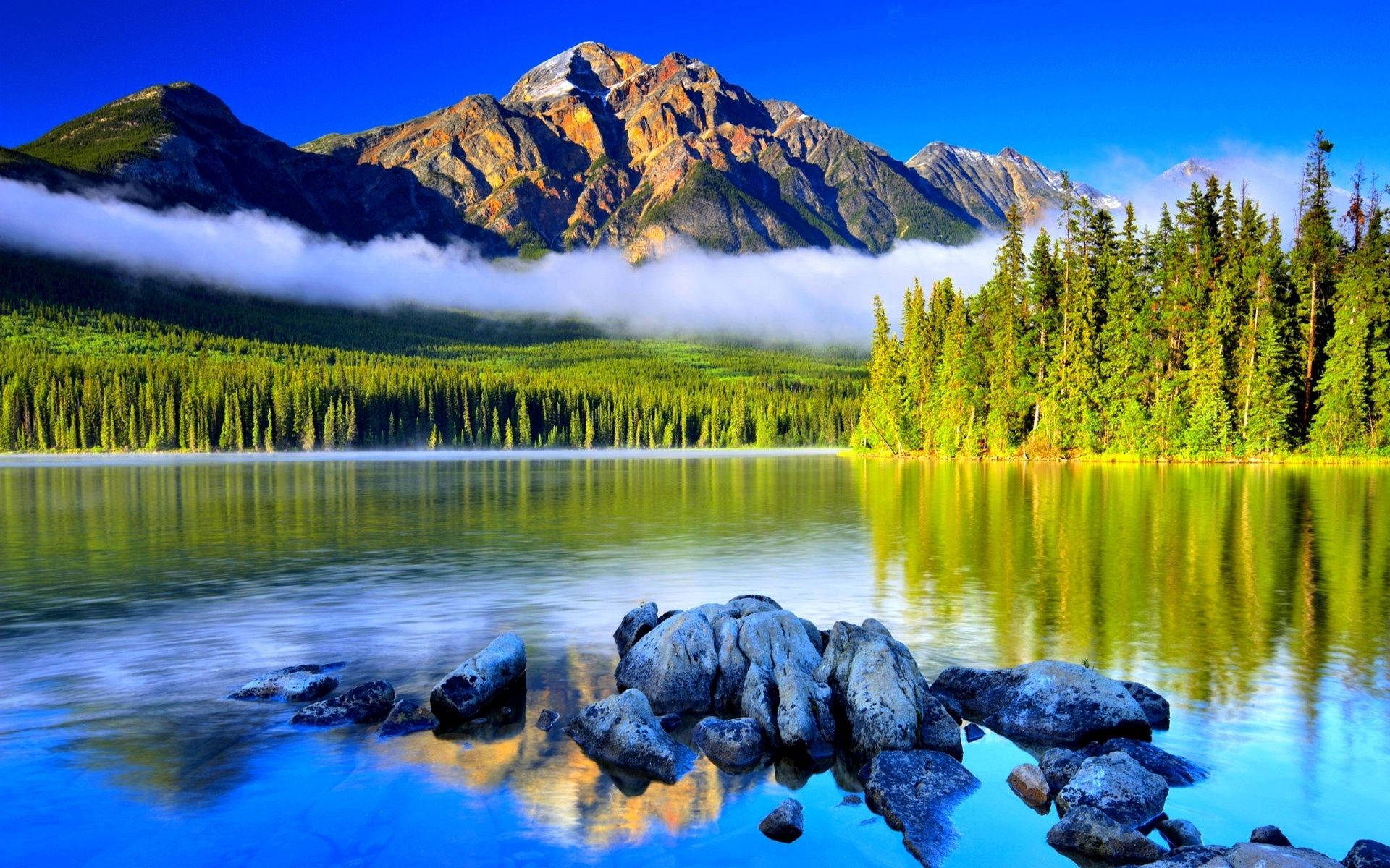 Enjoy the stunning beauty of Nature from this breathtaking Mountain View Wallpaper