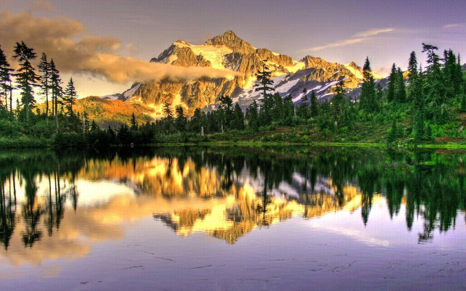 Enjoy the picturesque views of beautiful mountain panorama Wallpaper