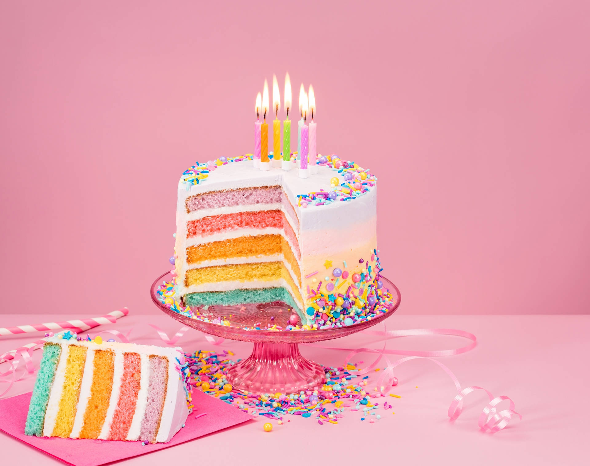 Caption: Glamorous Pastel Birthday Cake with Candles Wallpaper