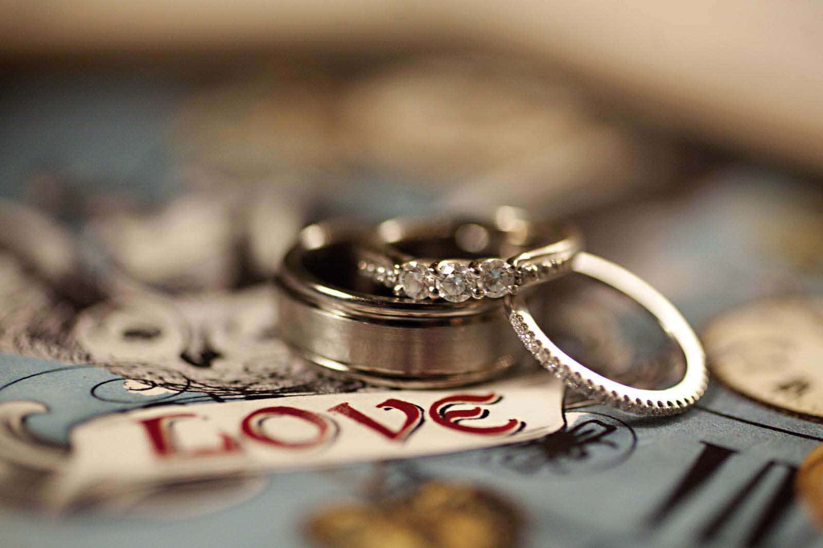 Download Beautiful Silver Engagement Couple Rings Wallpaper 
