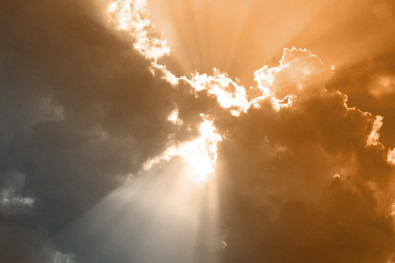 Beautiful Sun Rays On Funeral Clouds