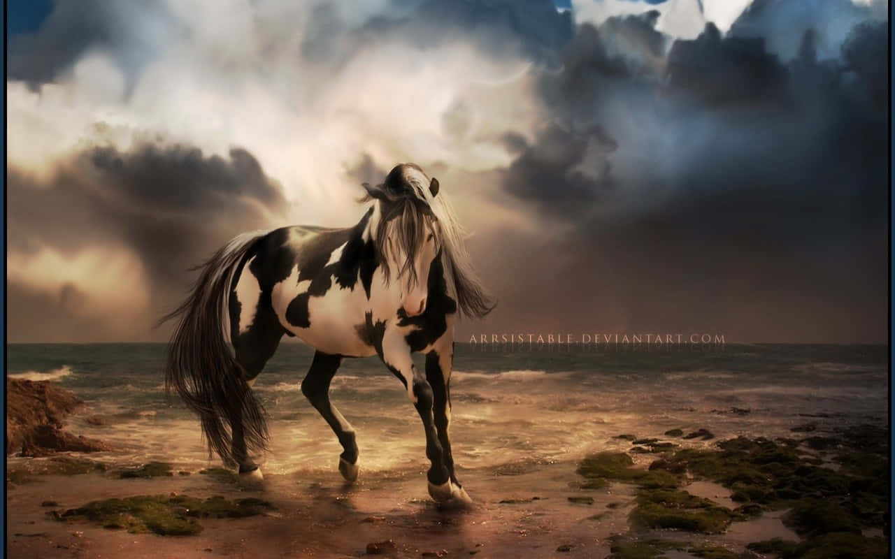 A Horse Standing On The Beach Under A Cloudy Sky Wallpaper