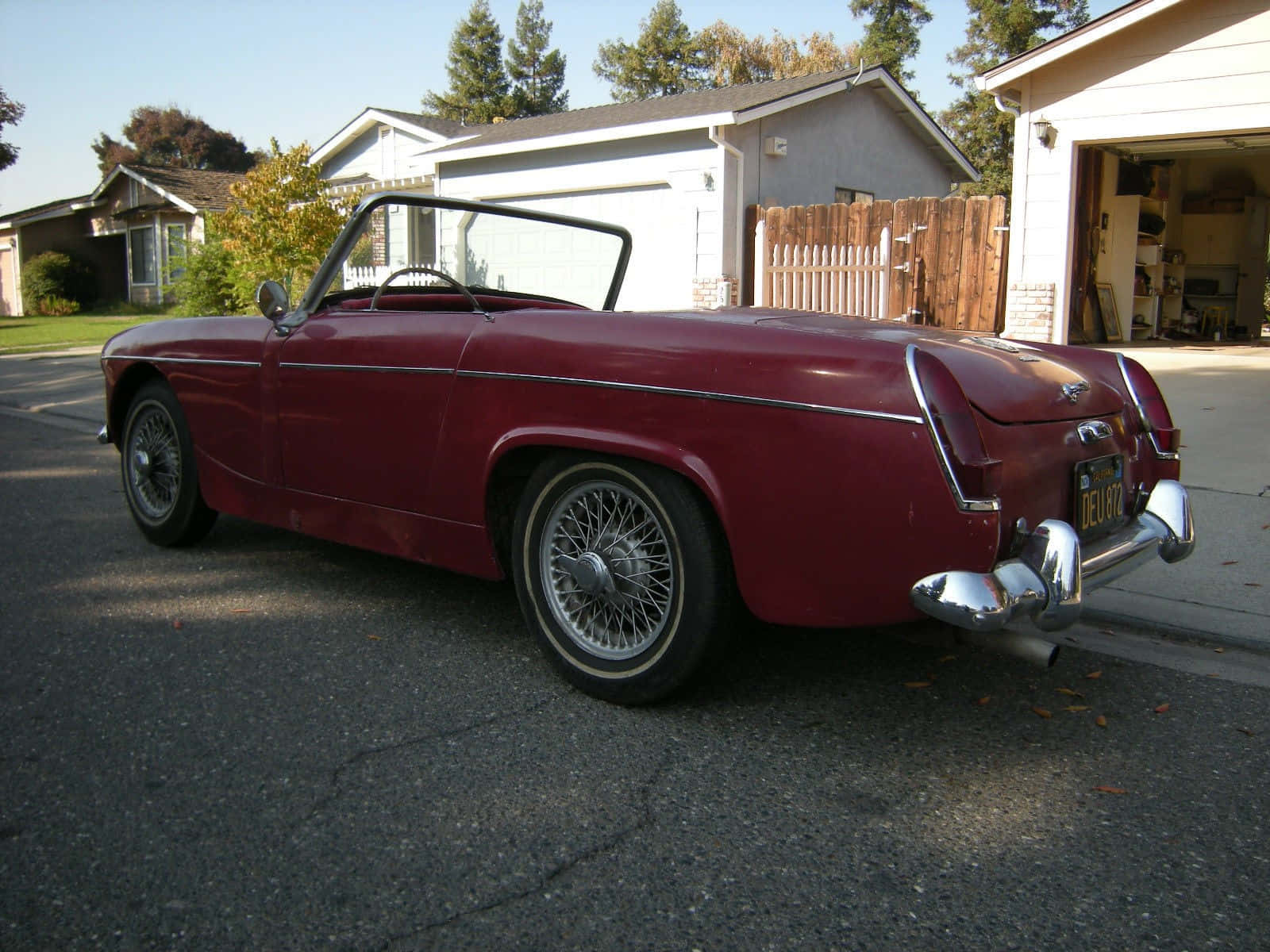 Beautiful Vintage Mg Midget On Scenic Route Wallpaper