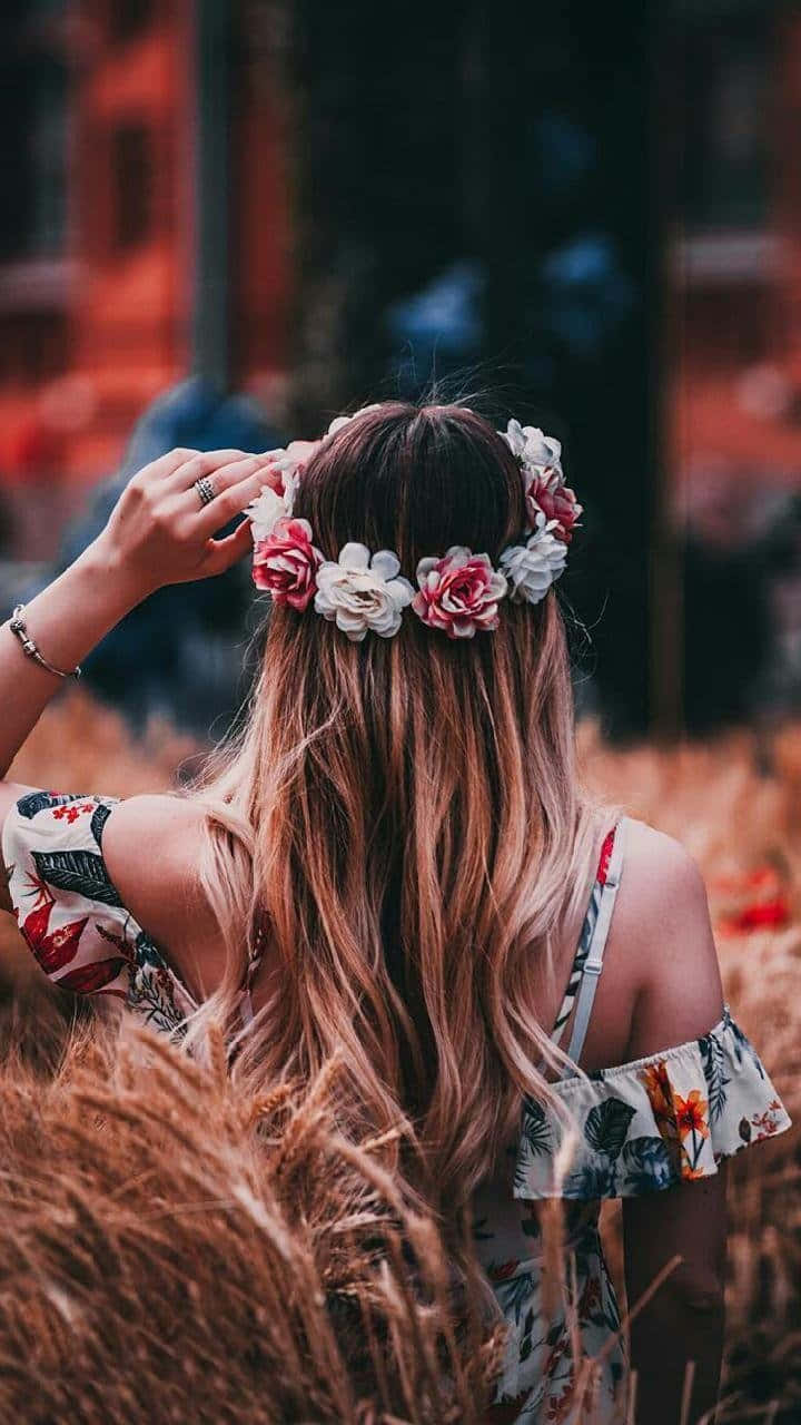 Beautiful Woman Wearing Vibrant Flower Crown Wallpaper