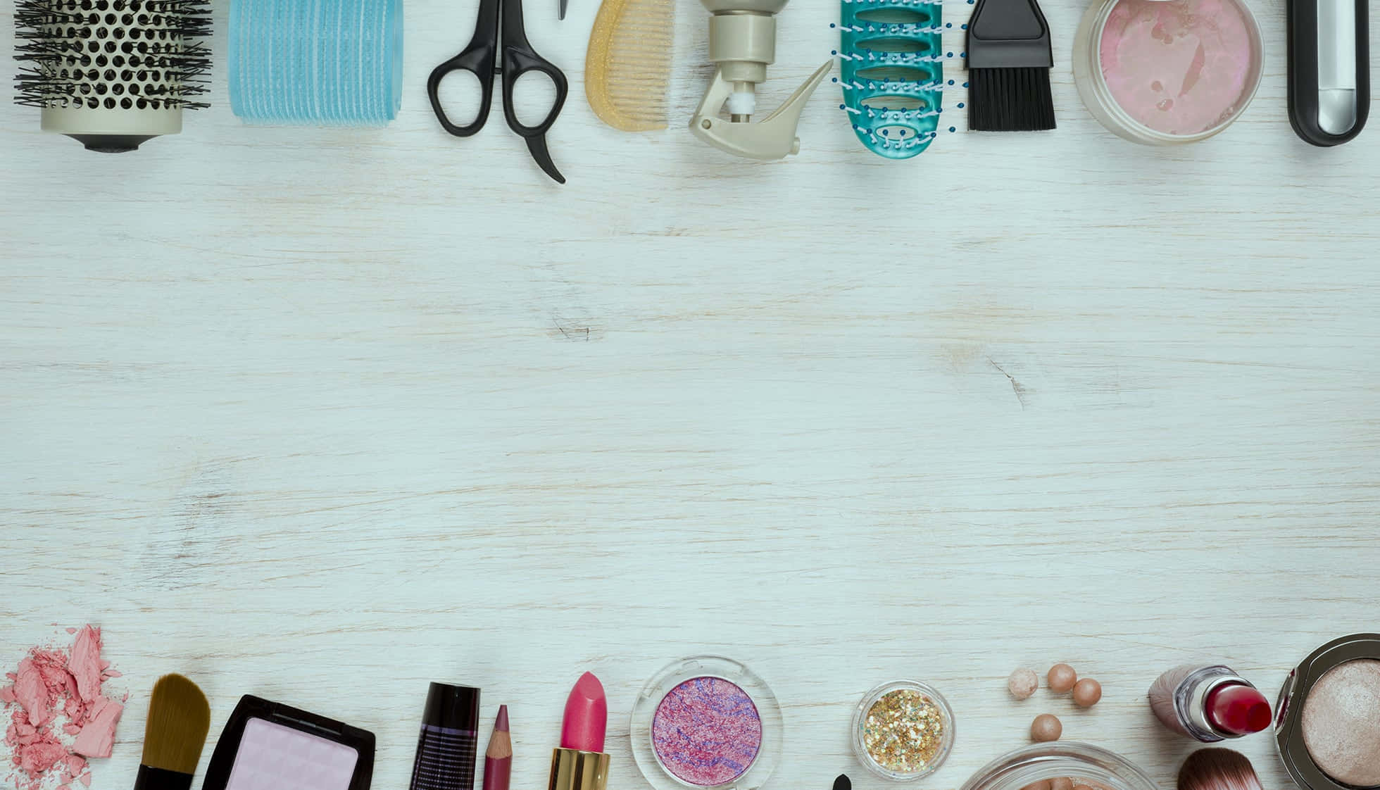 A Row Of Beauty Products On A White Table