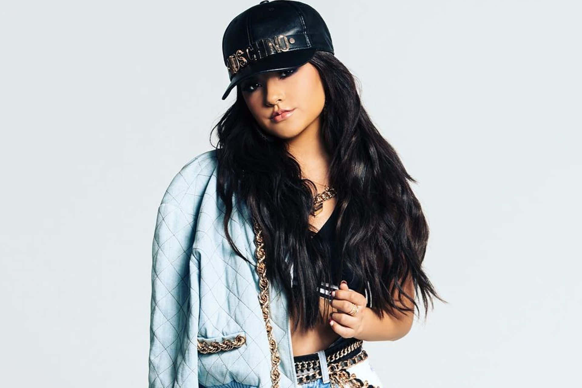 "Becky G Posing in Front of a White Background"