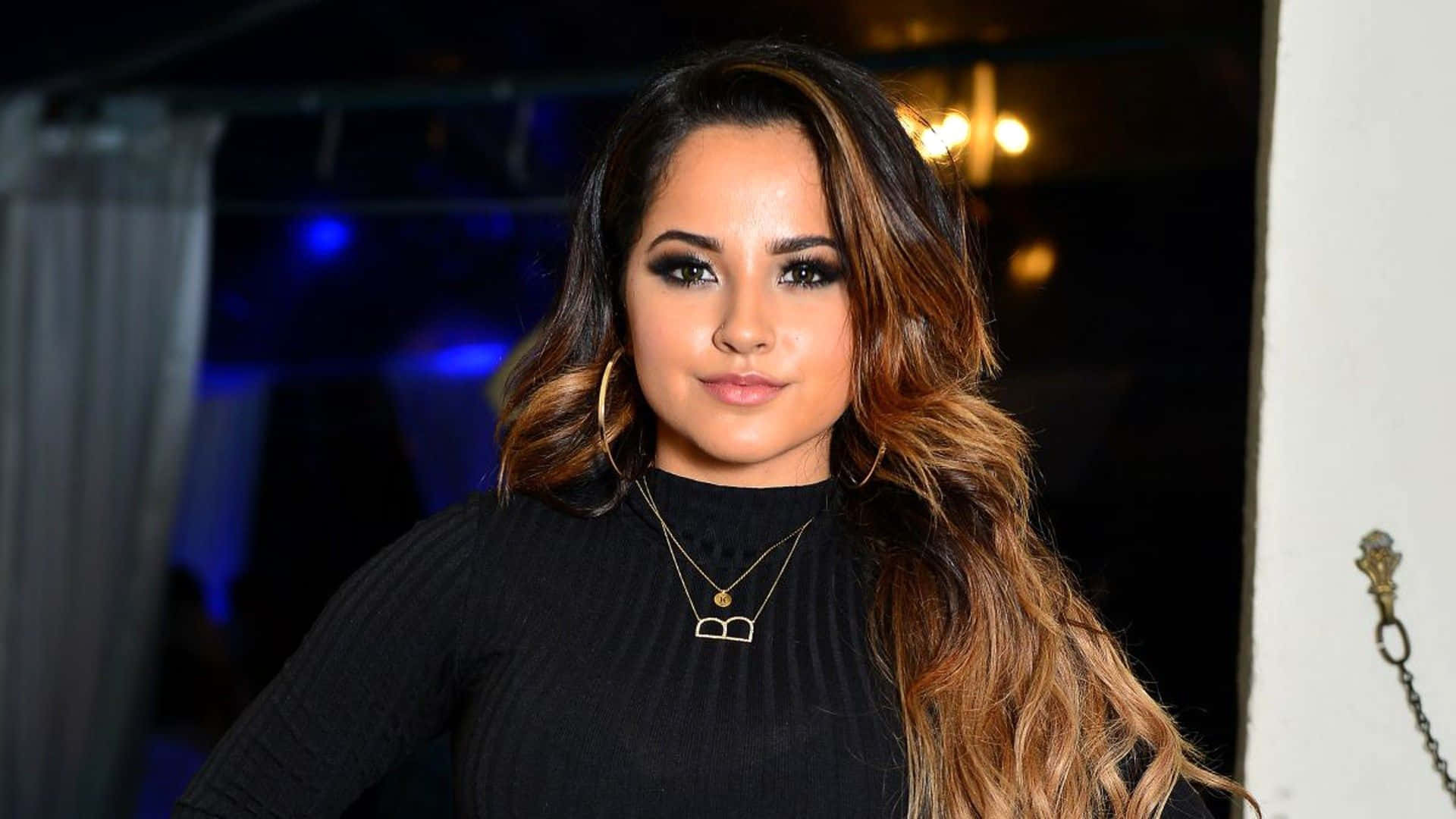 Singer and songwriter Becky G performing onstage