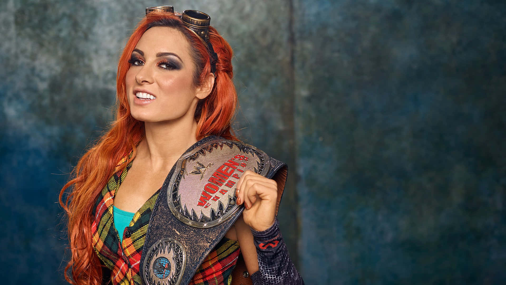 Becky Lynch Proud With Championship Belt Wallpaper