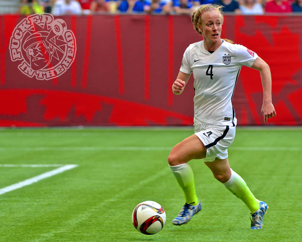 Becky Sauerbrunn Dominating In The Game Wallpaper