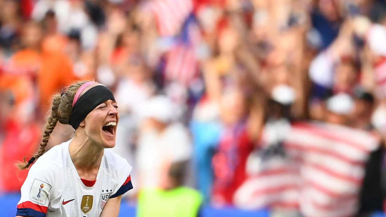 Becky Sauerbrunn I Aksjon Under Fotballkampen Bakgrunnsbildet