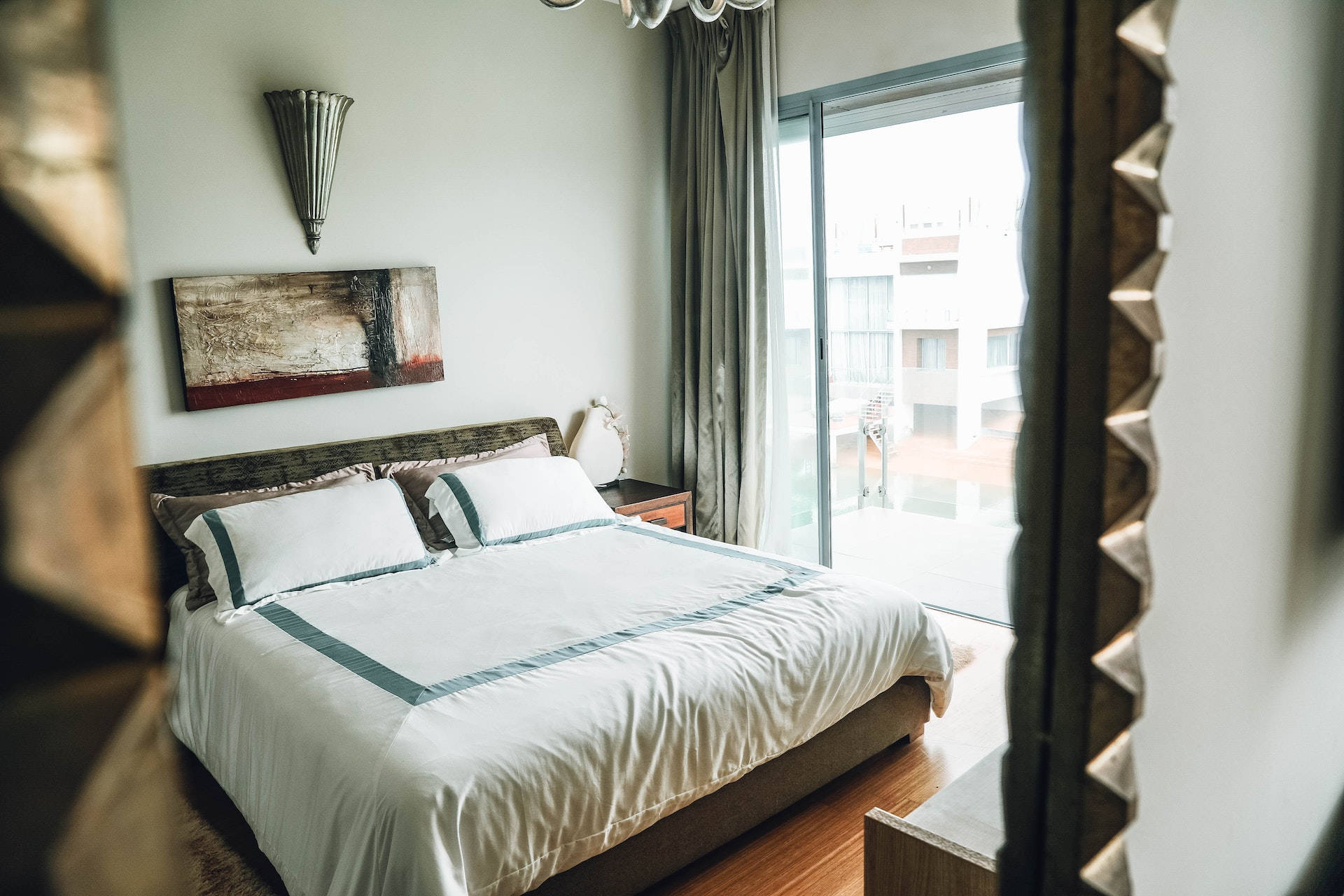 Elegant Bedroom with Stylish Mirror Wallpaper