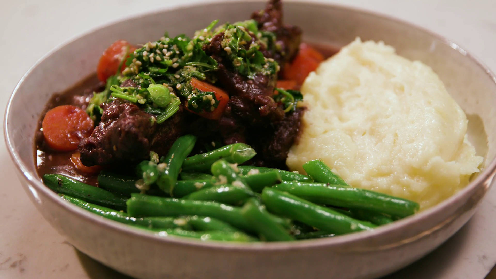 Delectable Beef Bourguignon Served With Fresh String Beans Wallpaper