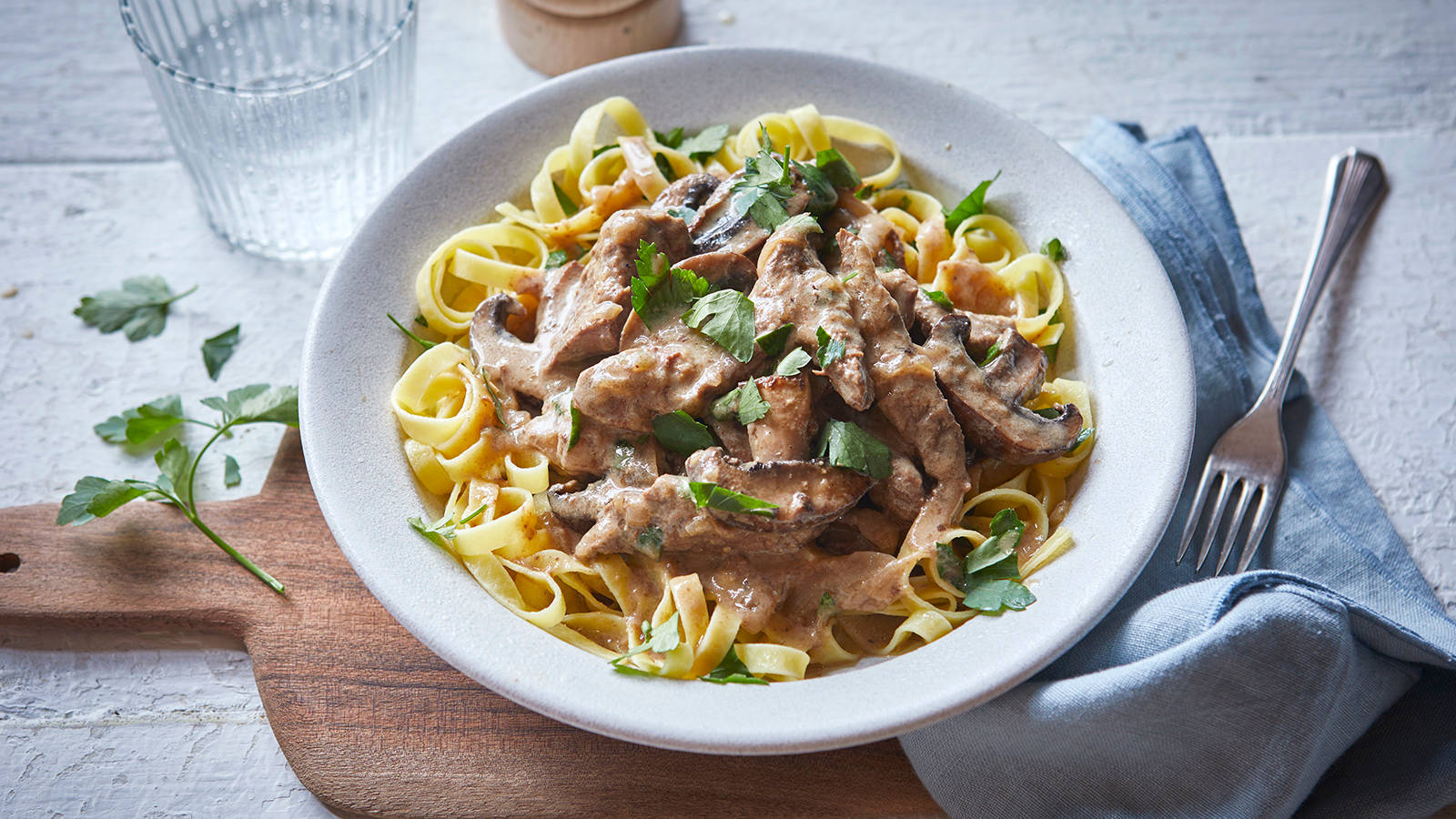 Decadent Beef Stroganoff with Pasta and Fresh Parsley Wallpaper