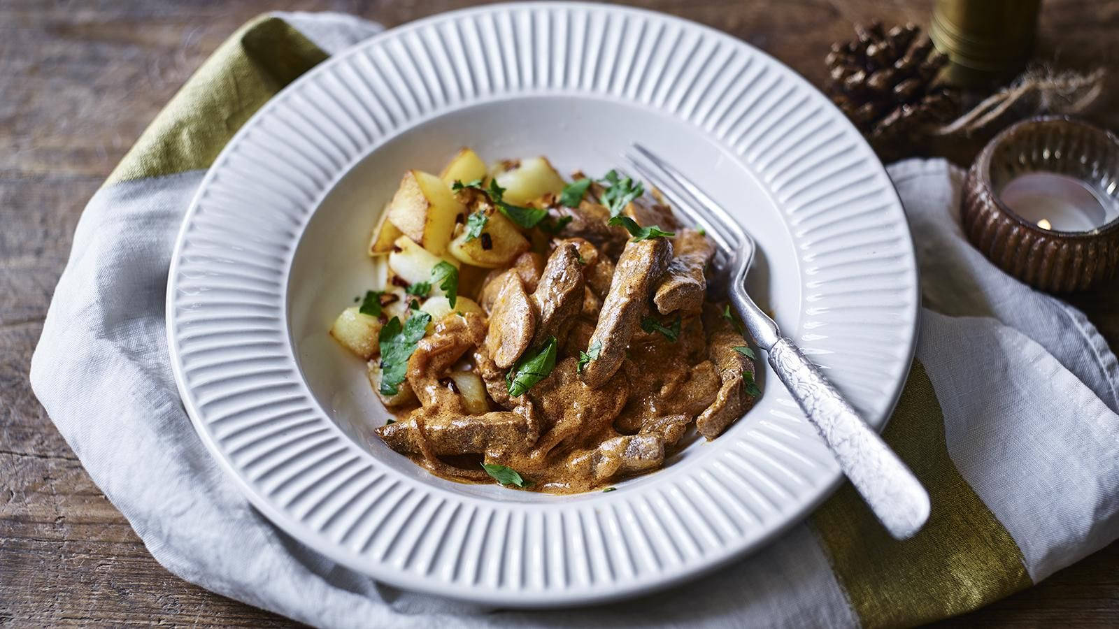 Hearty Homemade Beef Stroganoff with Steamed Potatoes Wallpaper