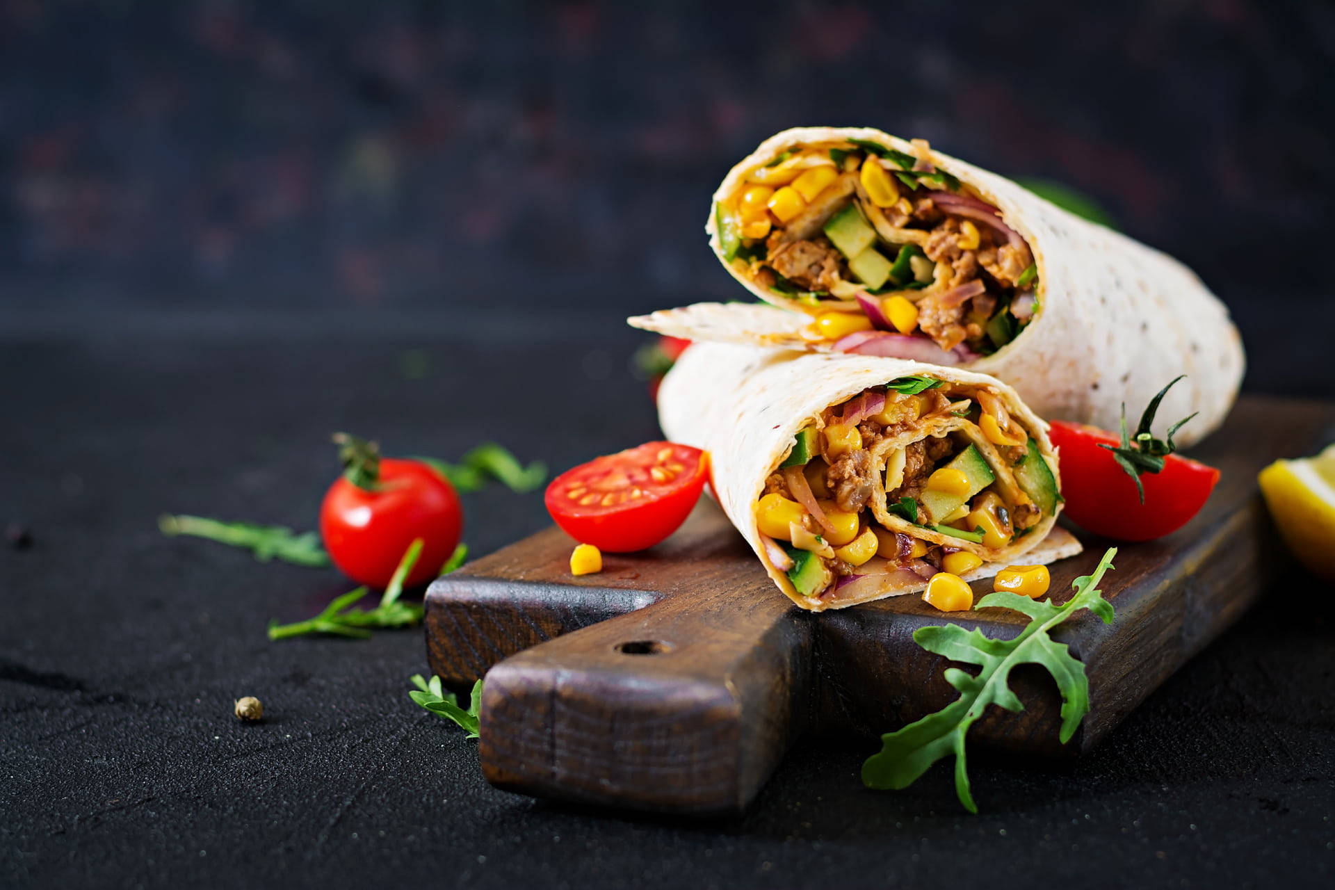 Caption: Savory Beef and Vegetable Burrito Wallpaper