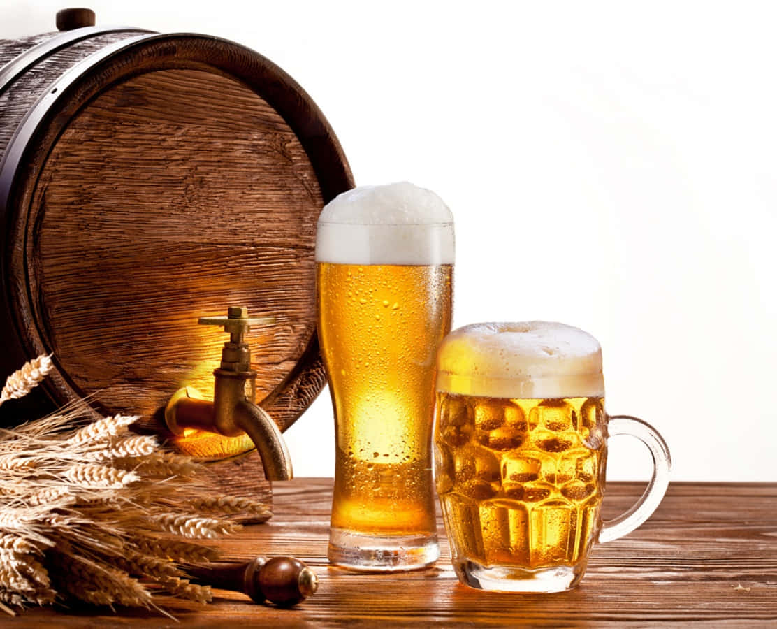 Two Glasses Of Beer On A Wooden Table