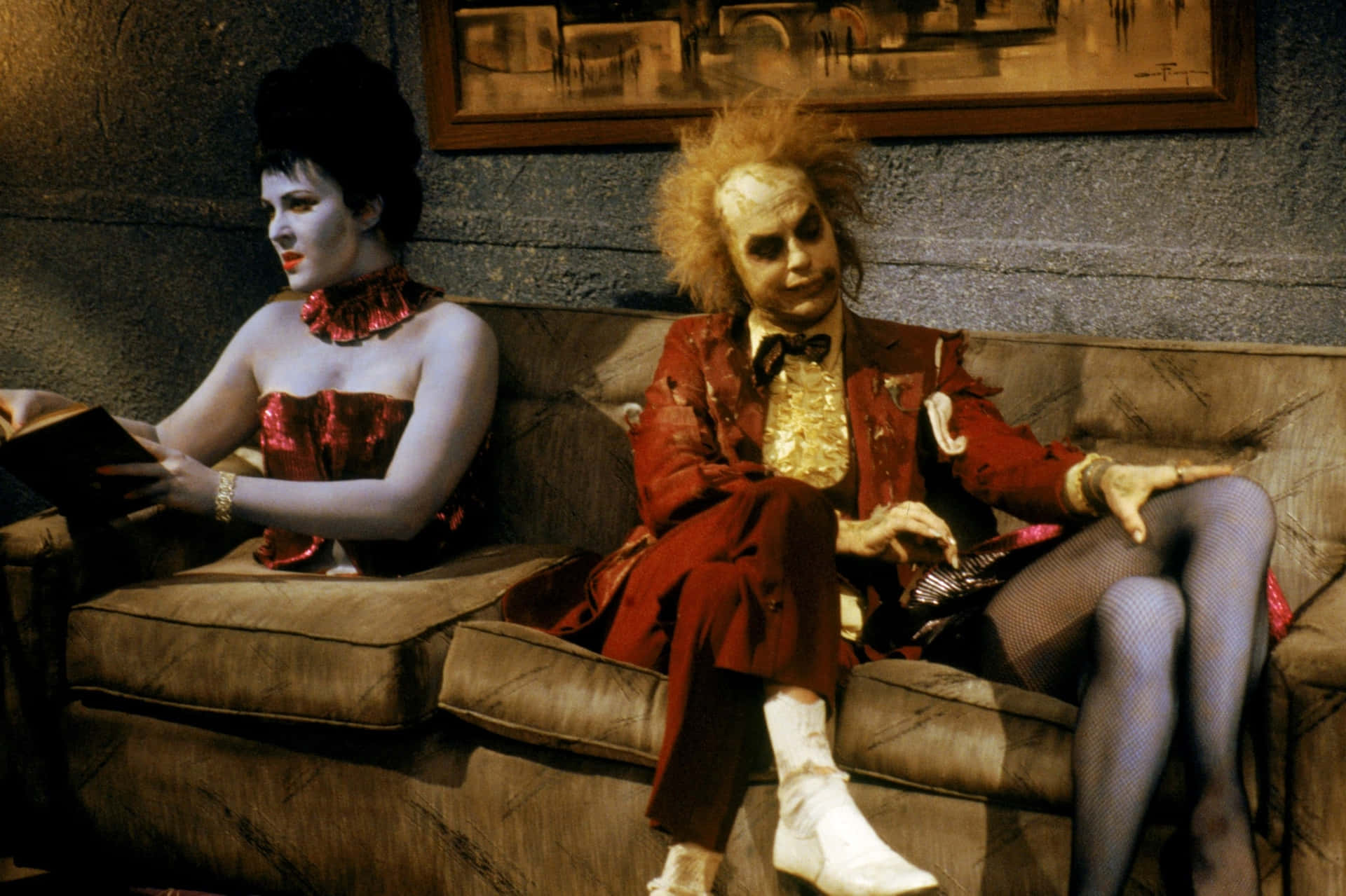 Beetlejuiceand Companionon Couch Wallpaper