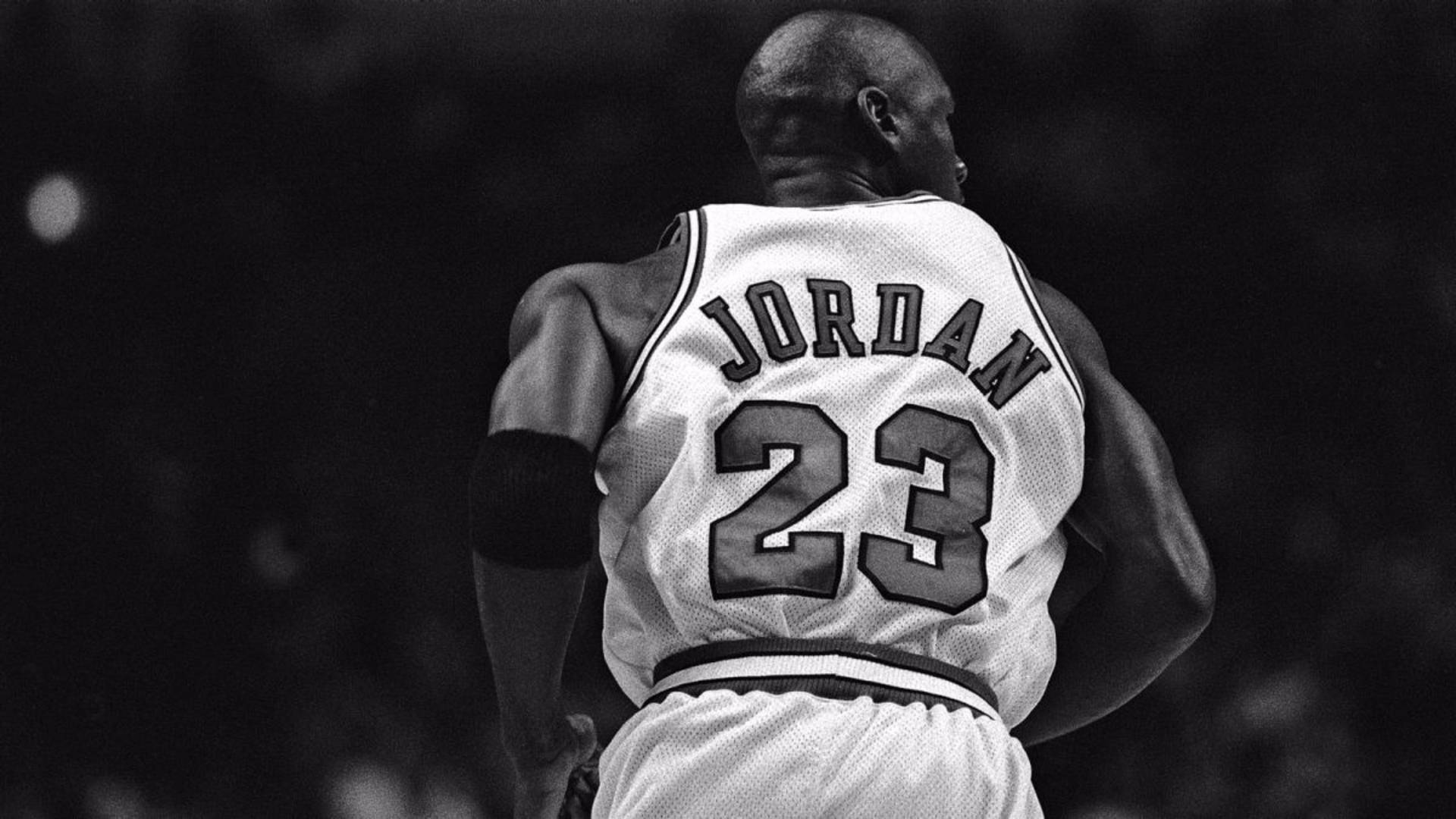 Behind Michael Jordan White Jersey