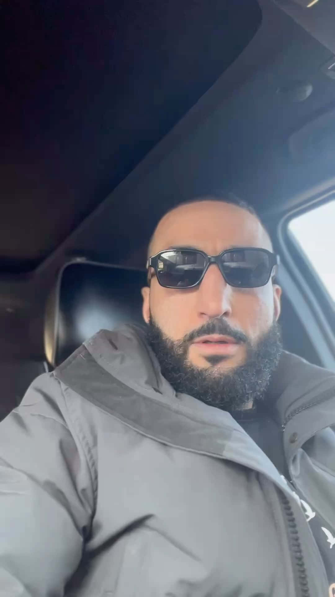 Belal Muhammad Wearing Sunglasses In The Car Wallpaper