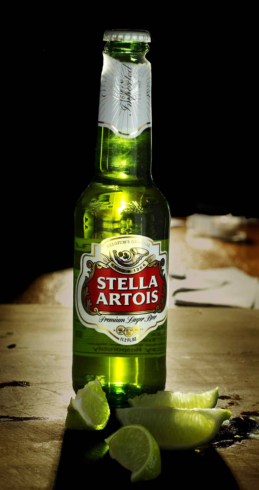 Download Belgian Beer Stella Artois With Lime Wallpaper | Wallpapers.com