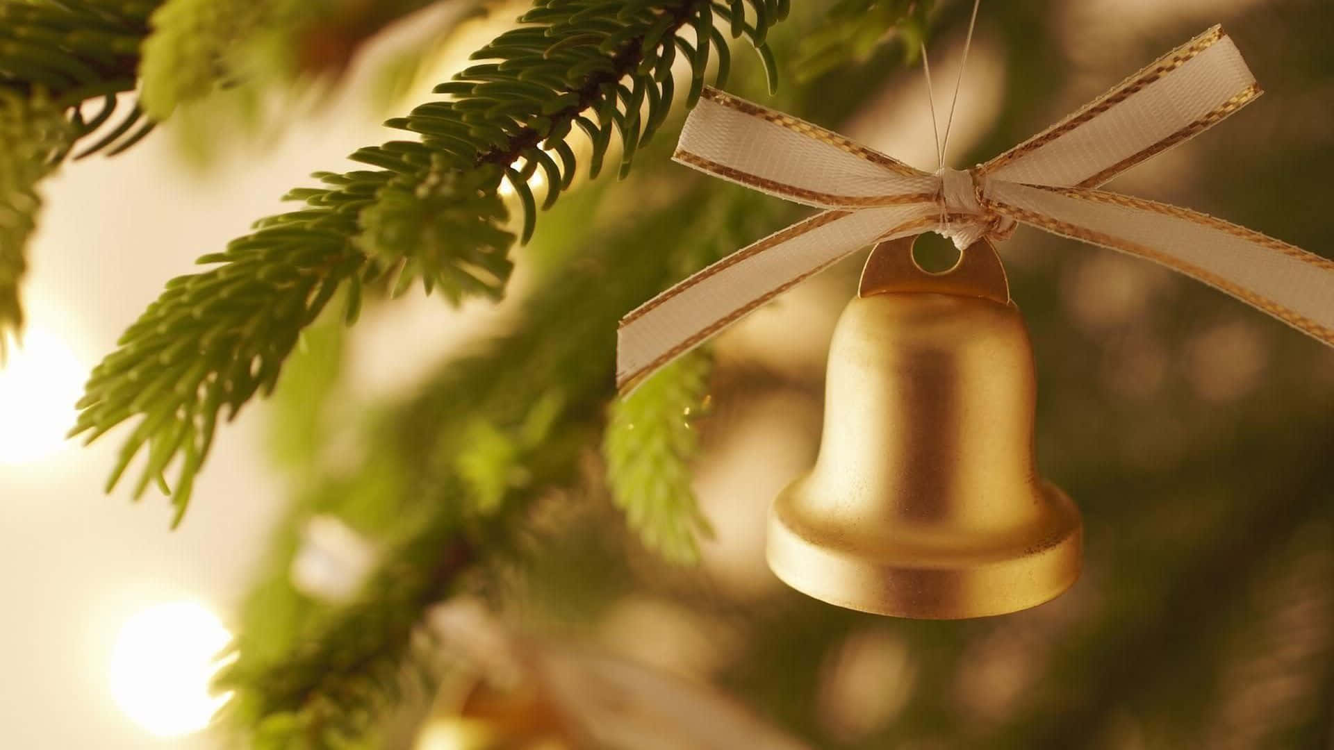Christmas Bells Hanging On A Christmas Tree
