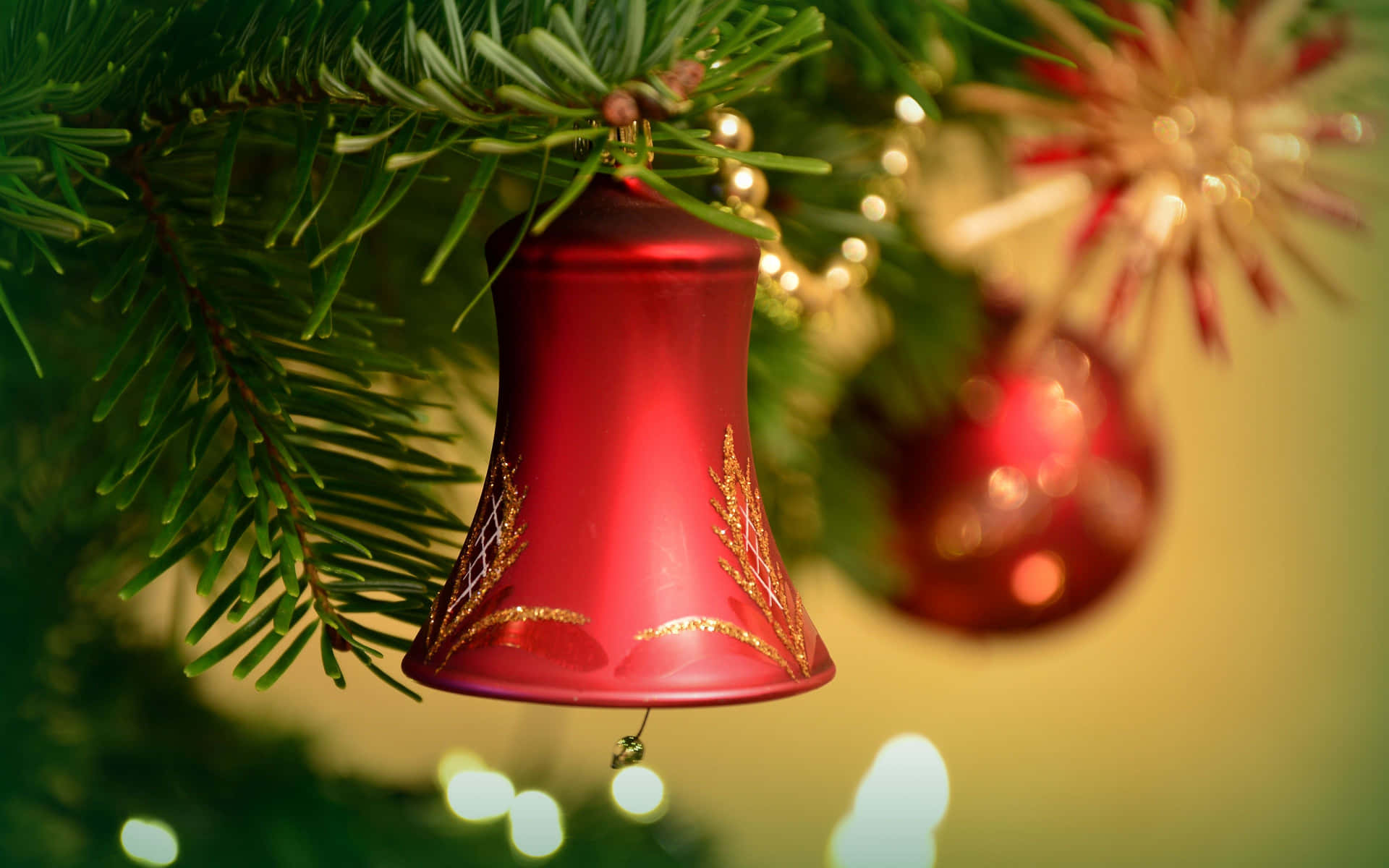 Christmas Bell Hanging On A Christmas Tree