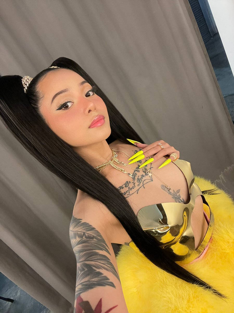 Bella Poarch In Yellow Outfit Selfie Wallpaper