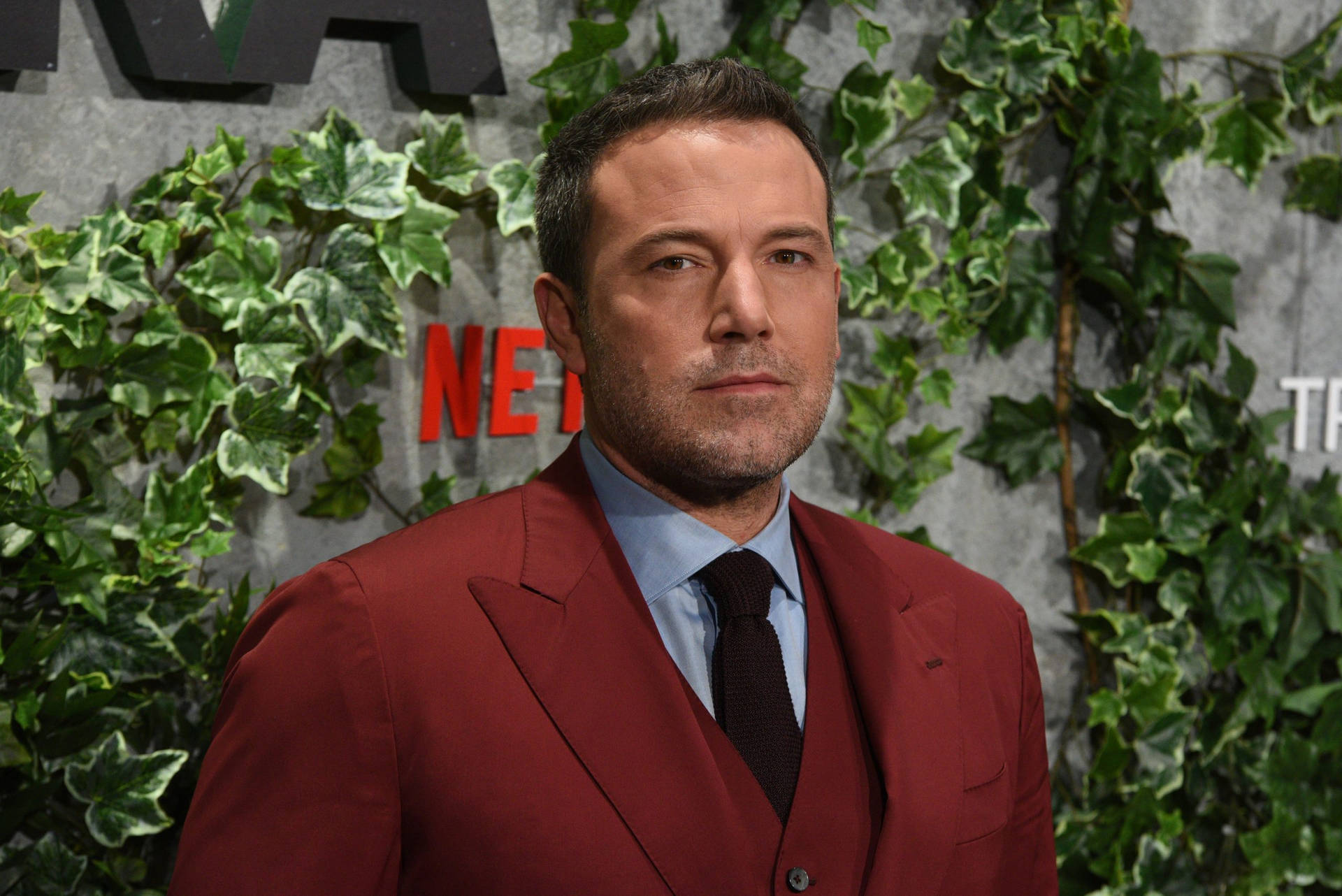 Ben Affleck In Red Suit Background