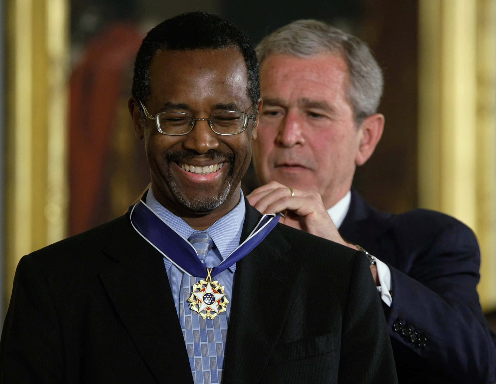 Ben Carson and George Bush Deep in Discussion Wallpaper