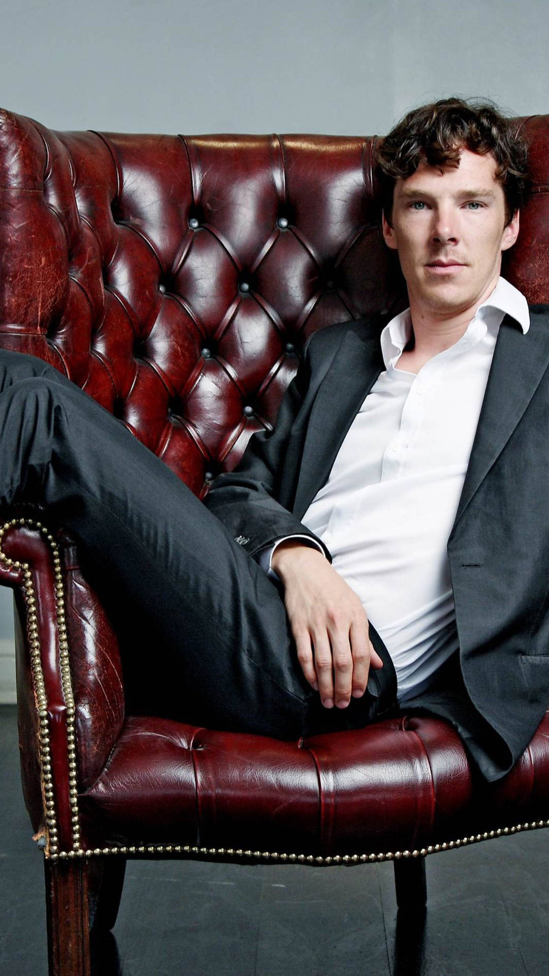 Benedict Cumberbatch Sitting On A Chair Wallpaper