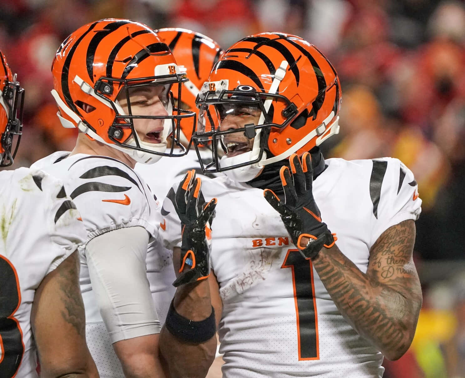 Bengals Players Celebrating On Field Wallpaper