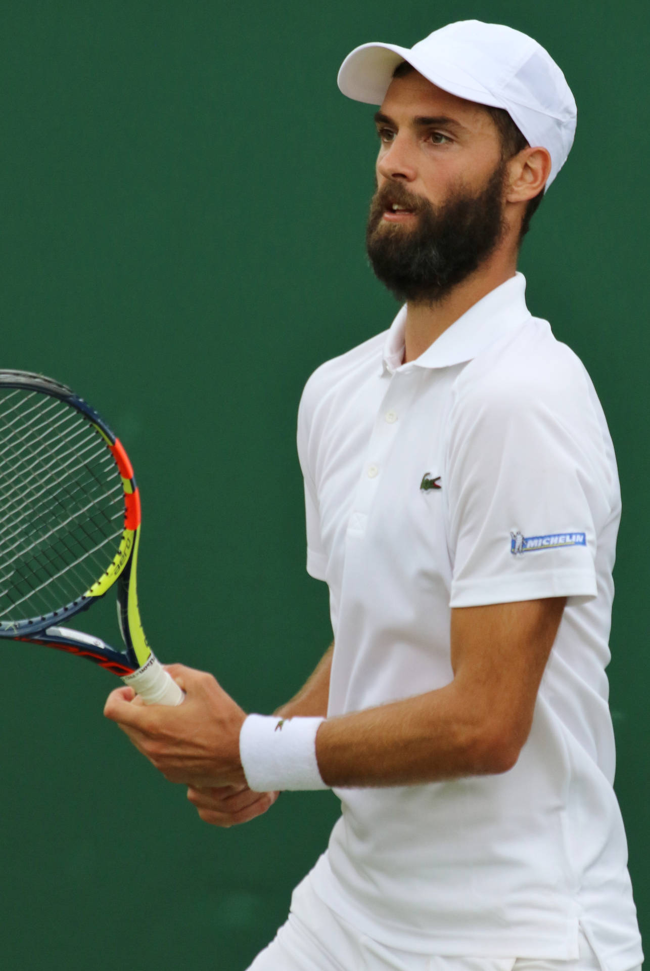 Benoit Paire holder et grip stærkt tennis racket Wallpaper