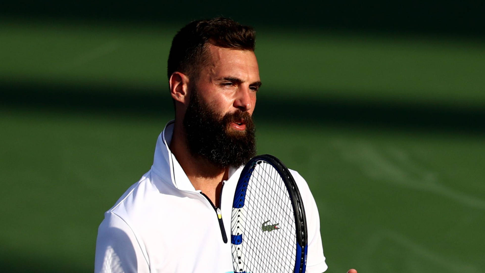 French tennis star Benoit Paire in action on tennis court. Wallpaper