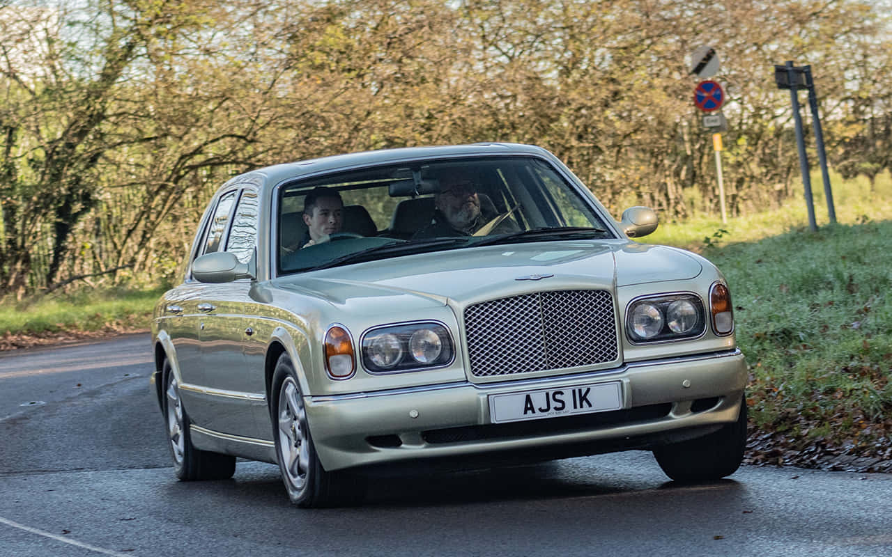 Luxurious Bentley Arnage in action on the open road Wallpaper