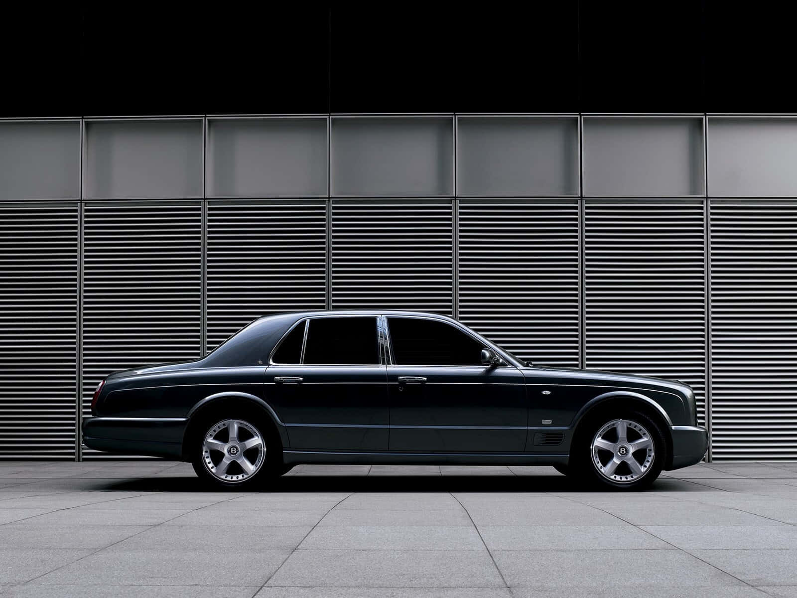 A luxurious Bentley Arnage parked in an elegant setting Wallpaper