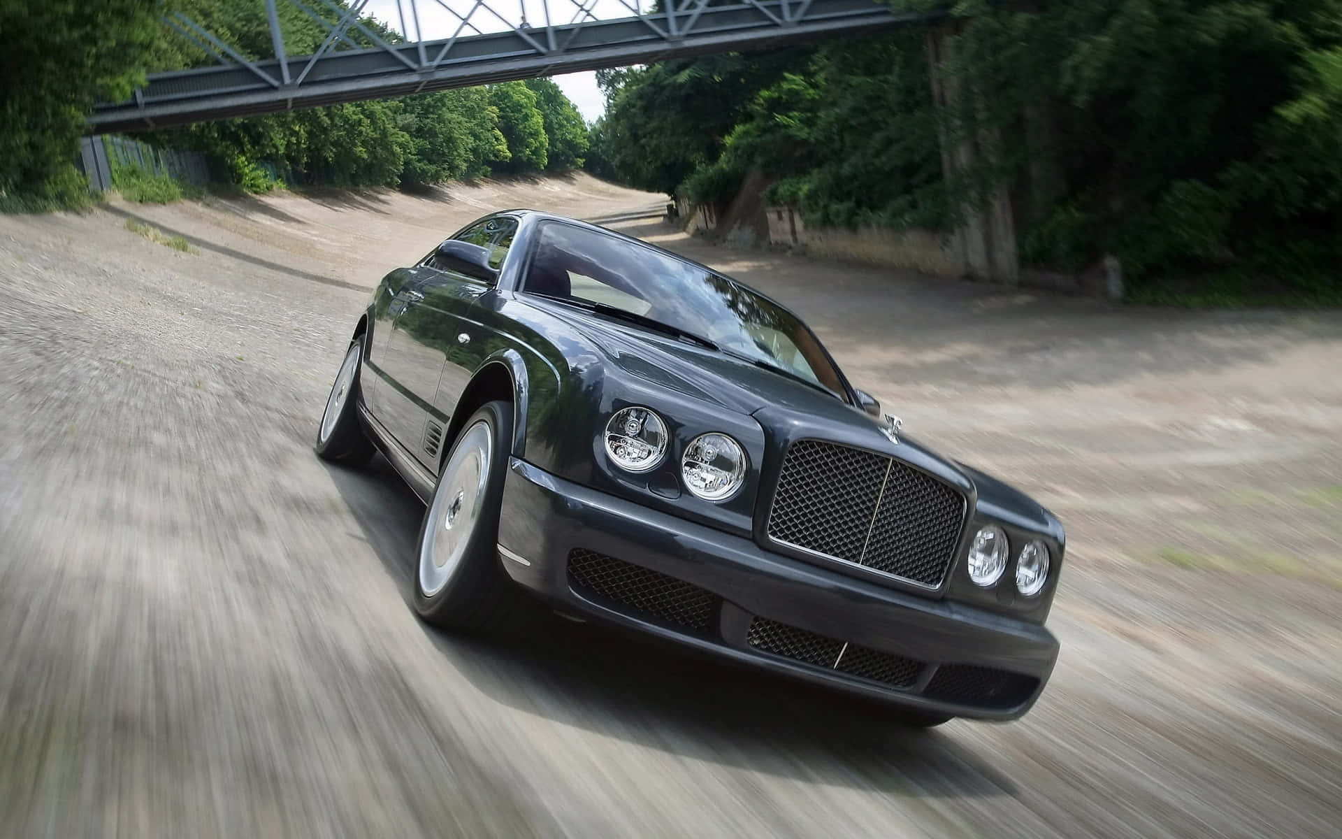 Luxurious Bentley Brooklands on Scenic Road Wallpaper