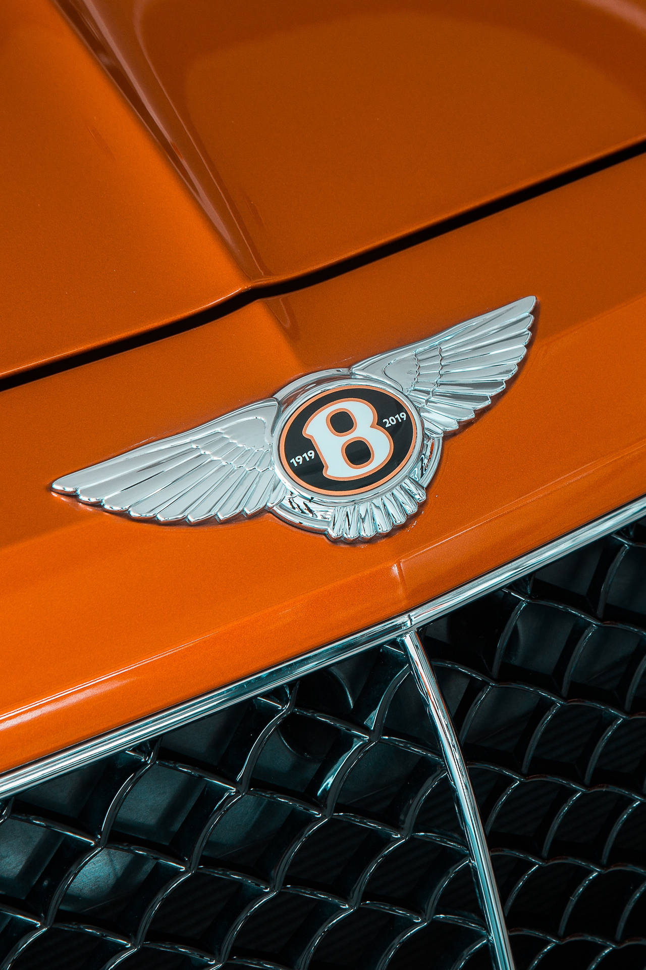 Download Bentley Cars Logo On Orange Wallpaper 