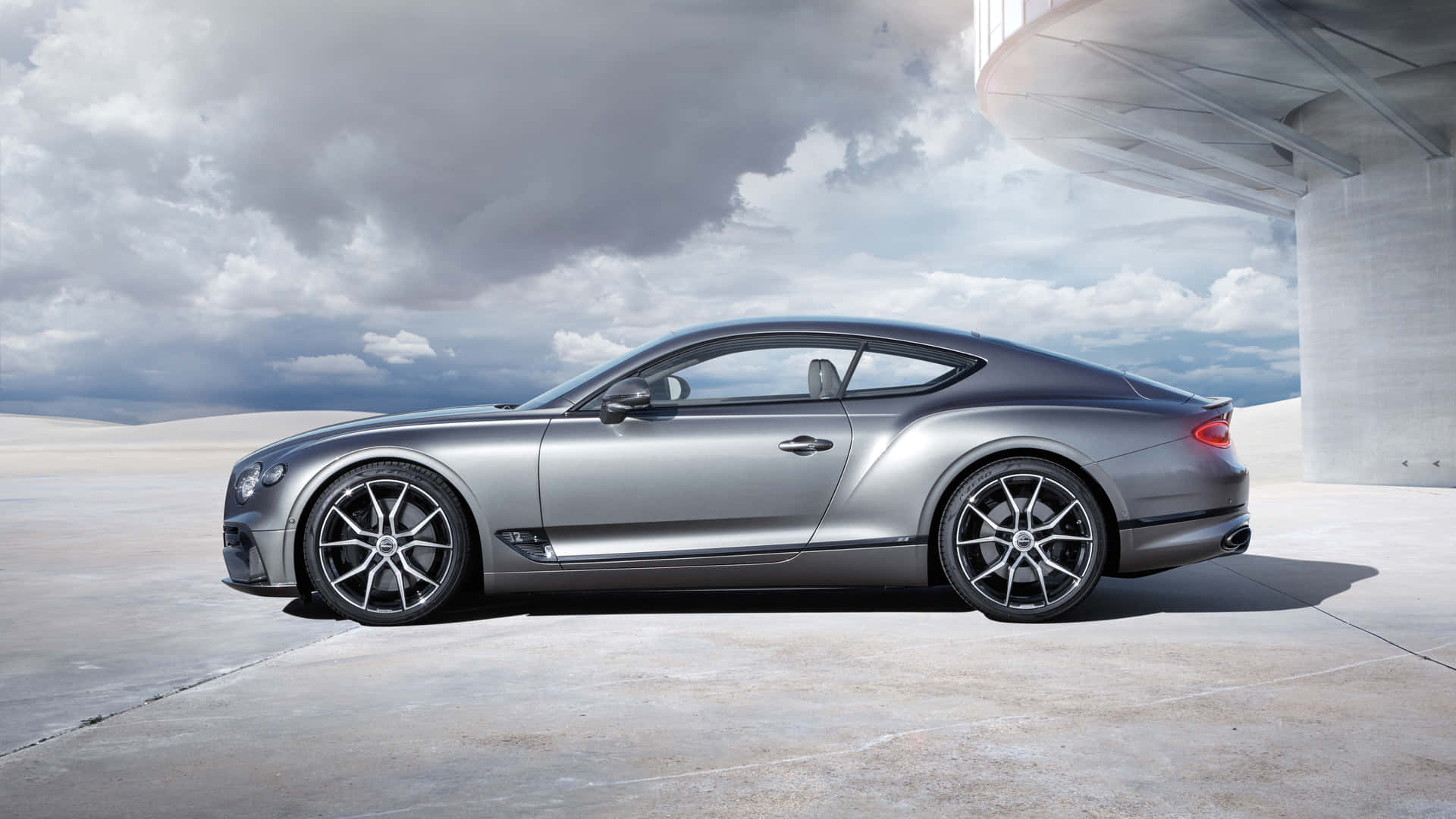 Stunning Bentley Continental GT in a Picturesque Scenic View Wallpaper