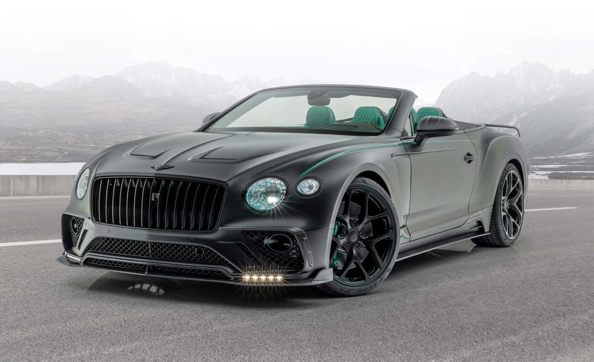 Luxurious Bentley Continental GT Convertible on the Road Wallpaper