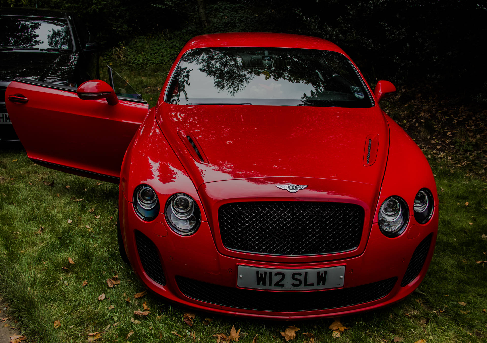 Experience Luxury with the Red Bentley Continental GT Wallpaper