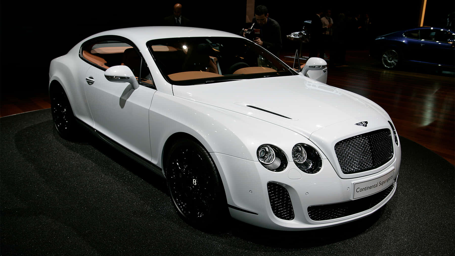 Sleek Bentley Continental Supersports in an urban environment Wallpaper