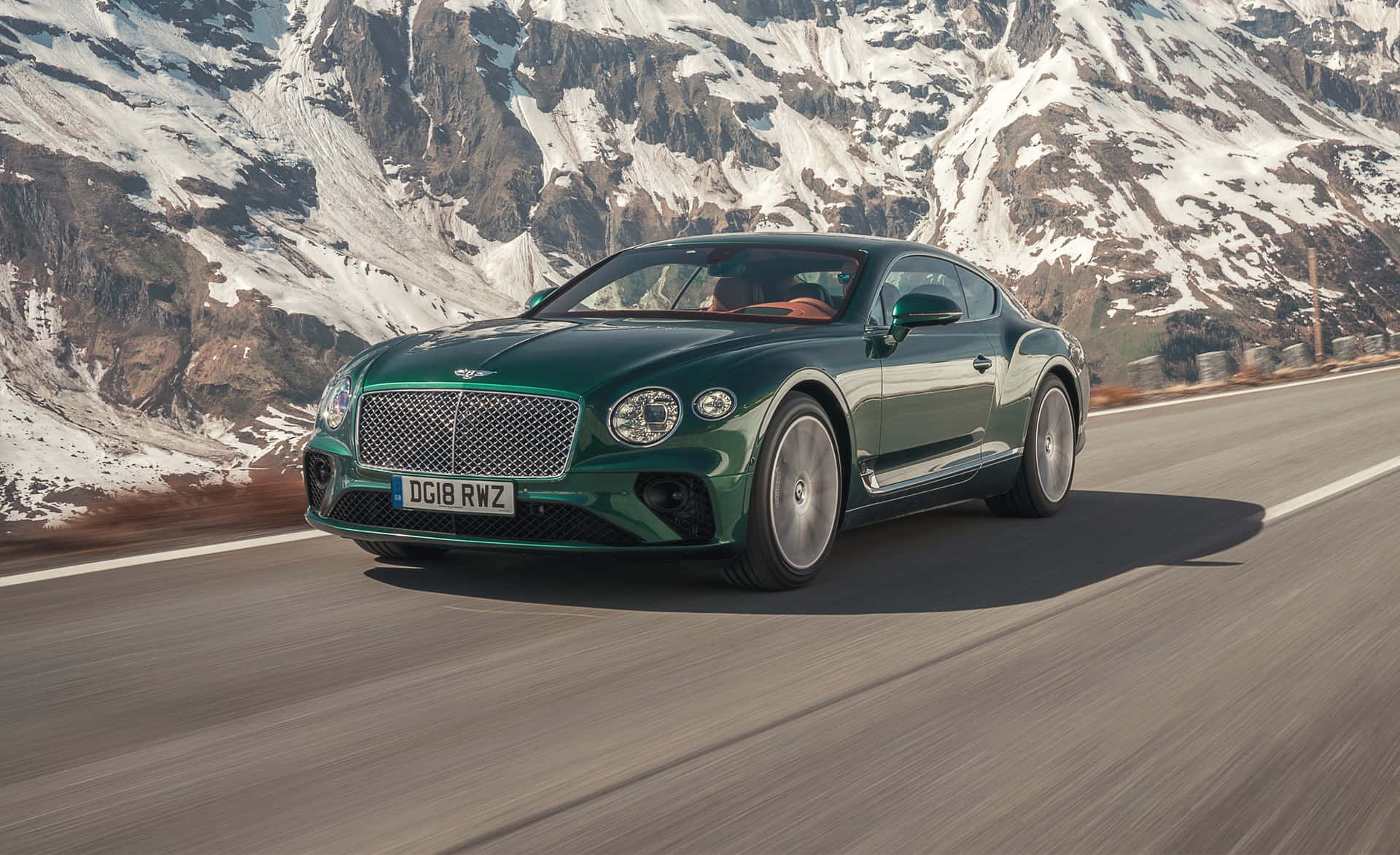 An exhilarating Bentley Continental Supersports in motion Wallpaper