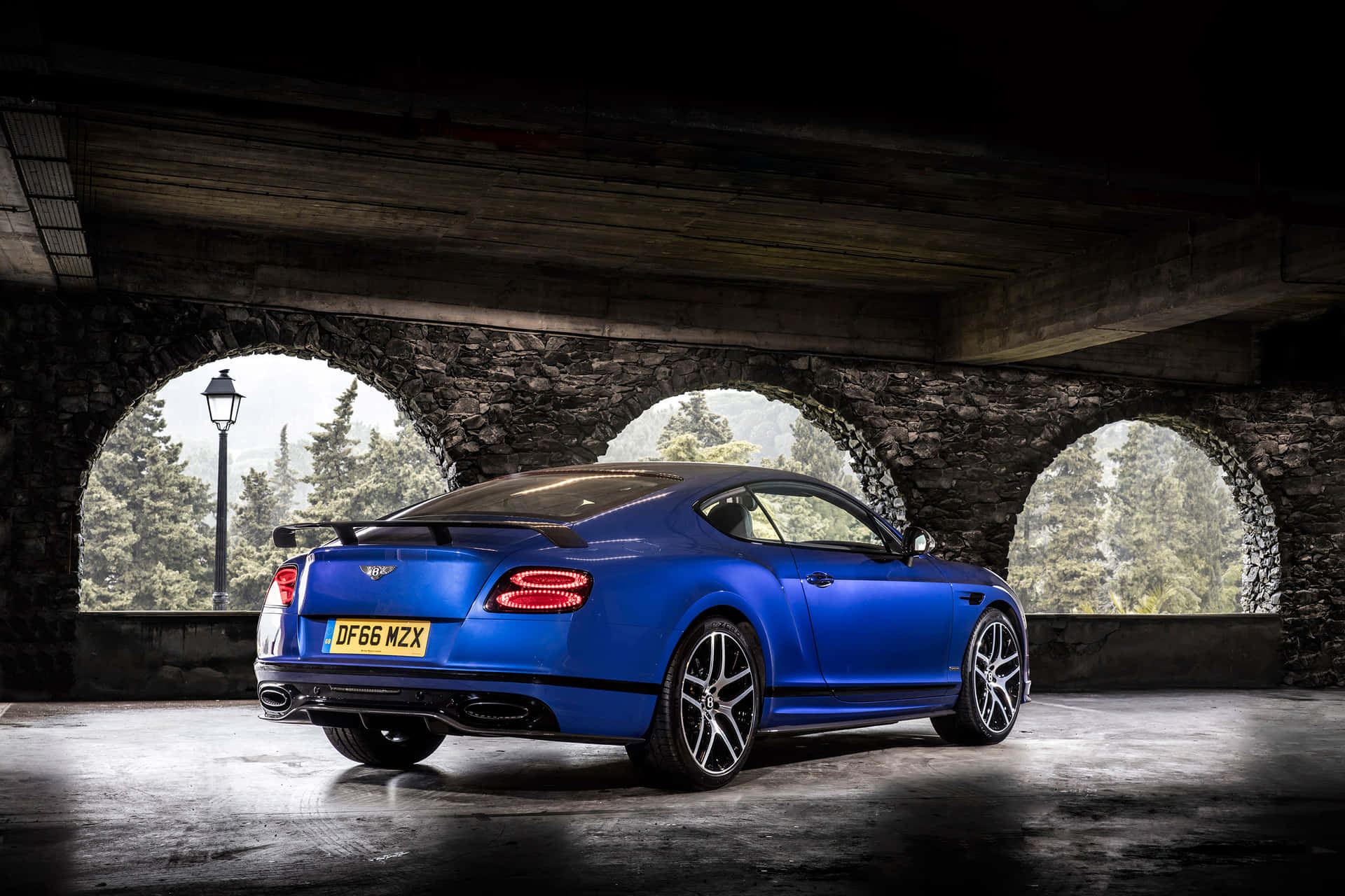 Sleek and Powerful Bentley Continental Supersports in Motion Wallpaper