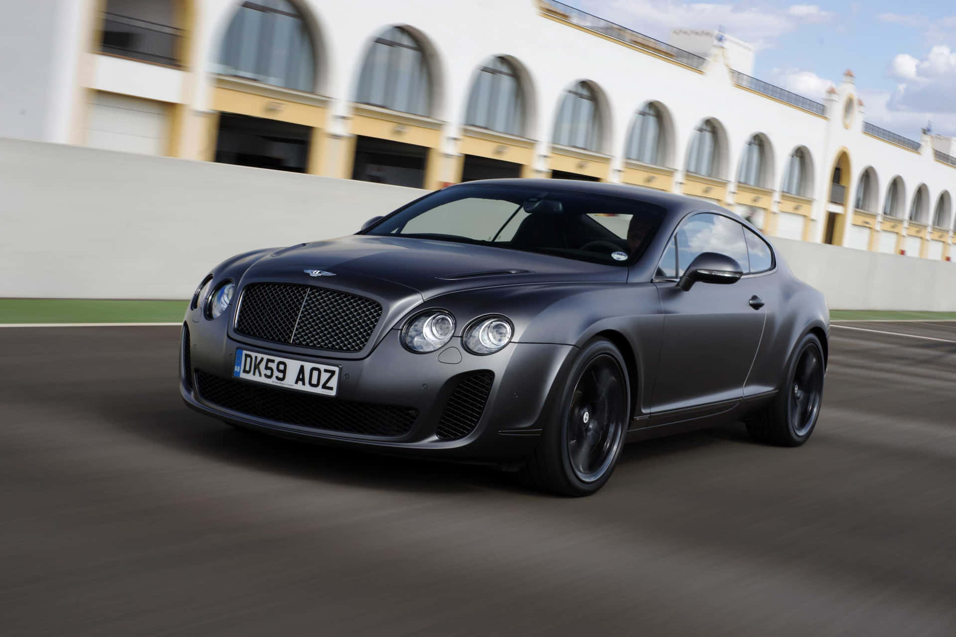 Sleek Bentley Continental Supersports in Action Wallpaper