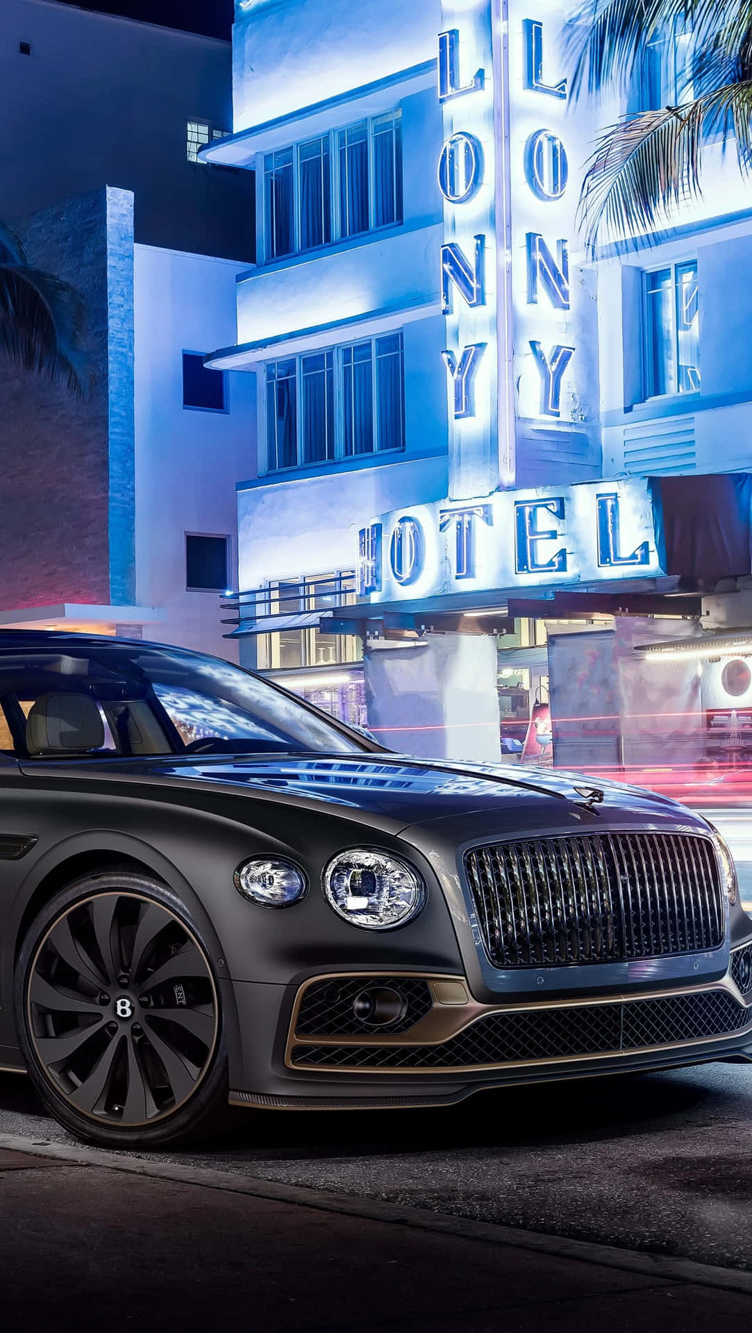 Captivating Elegance: Bentley Flying Spur in Pristine Surroundings Wallpaper