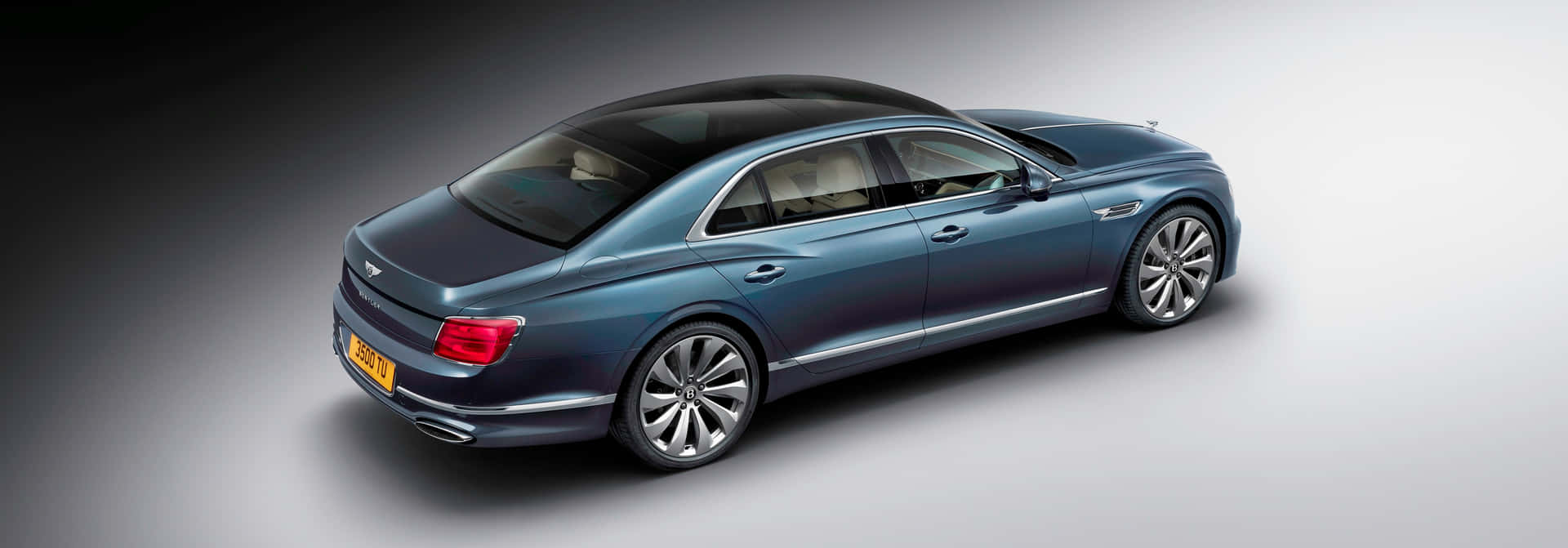 Experience Luxury with the Bentley Flying Spur Wallpaper