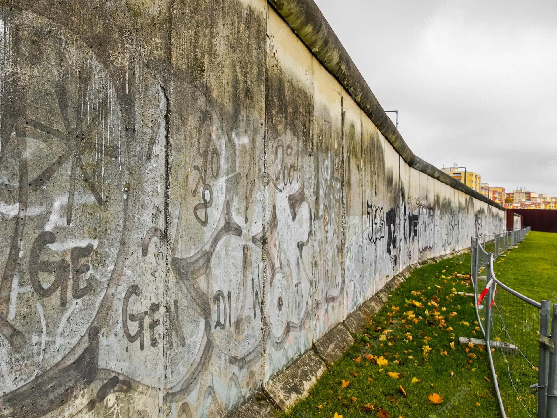 Berlin Wall On Green Grassland Background