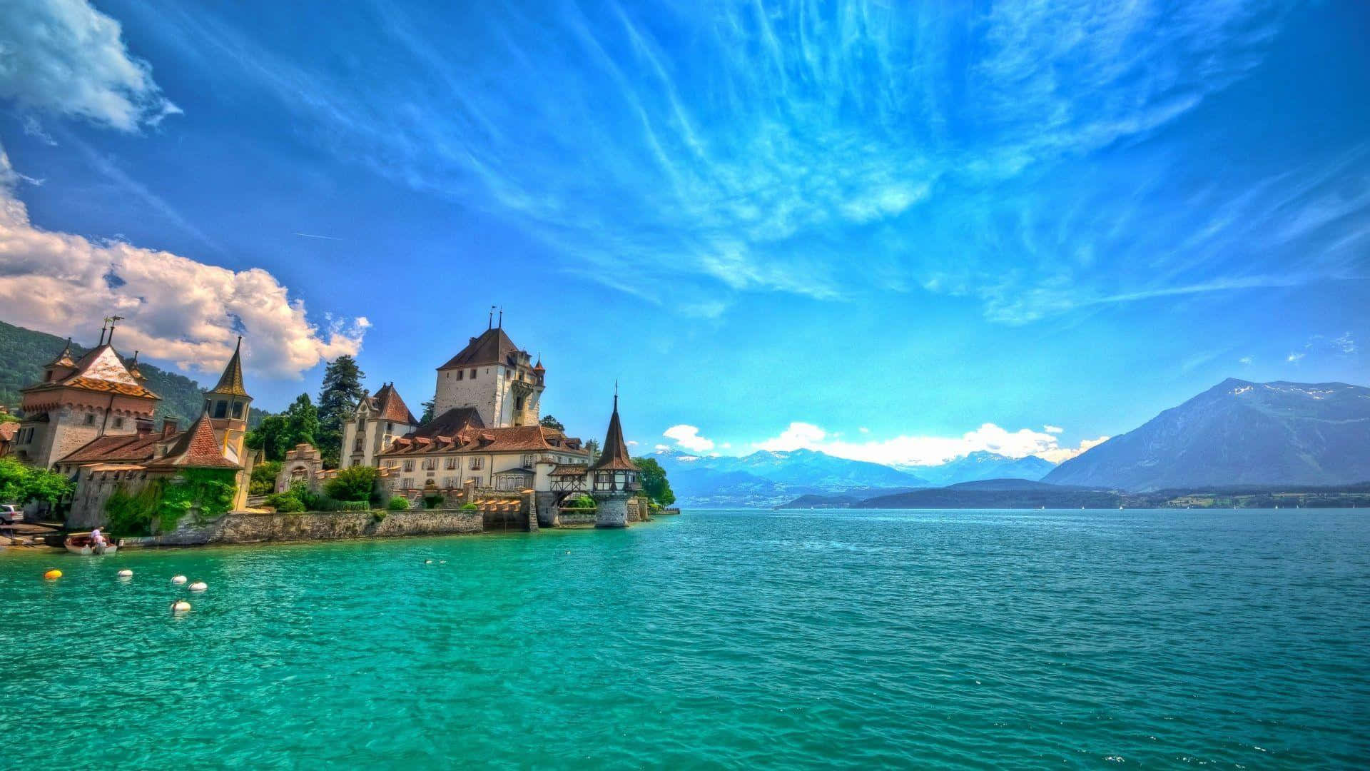 Bernese Oberland Lakeside Castle Switzerland.jpg Wallpaper