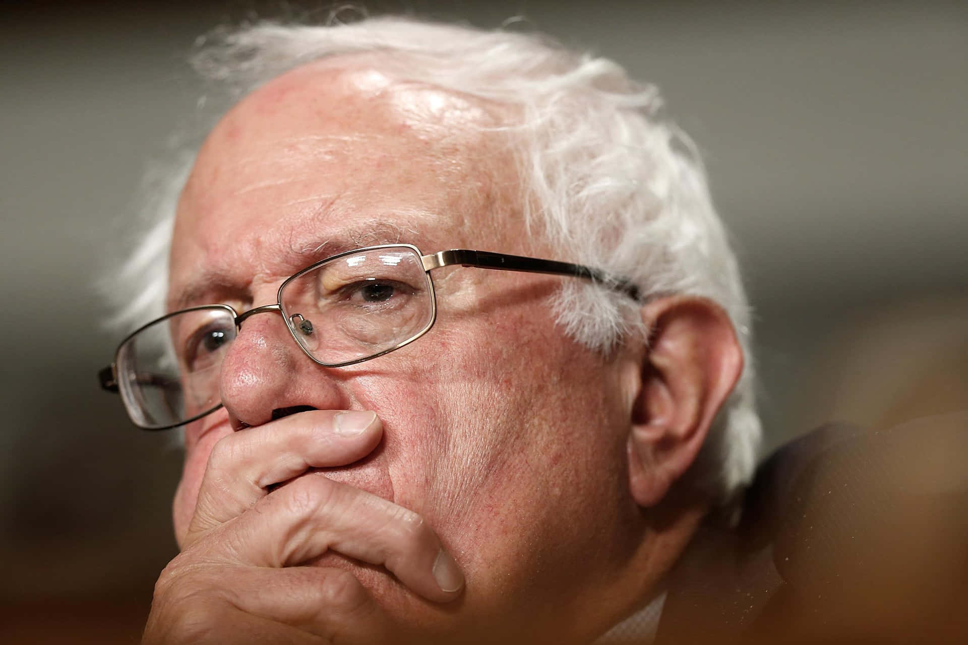 Bernie Sanders Contemplative Moment Wallpaper